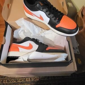 Jordan Black and Orange Low-Top Sneakers